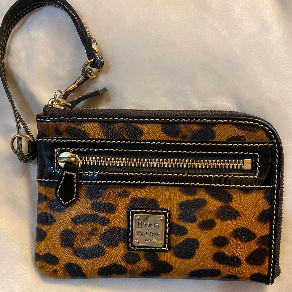 Dooney & Bourke leopard wristlet with patent trim